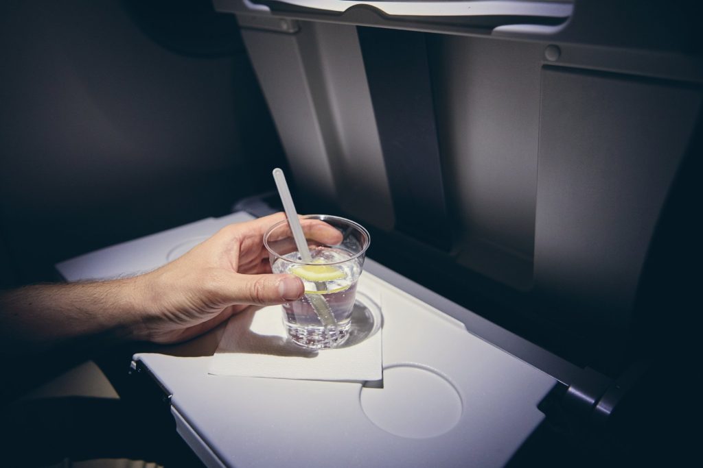 Travelers Sound Off About In-Flight Alcohol Limits and Faster Security Check-Ins