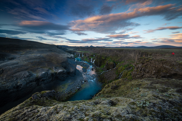 Iceland Landmannalaugar Valley of tears watefall canyon Sigoldugljufuratsunset with pink clouds